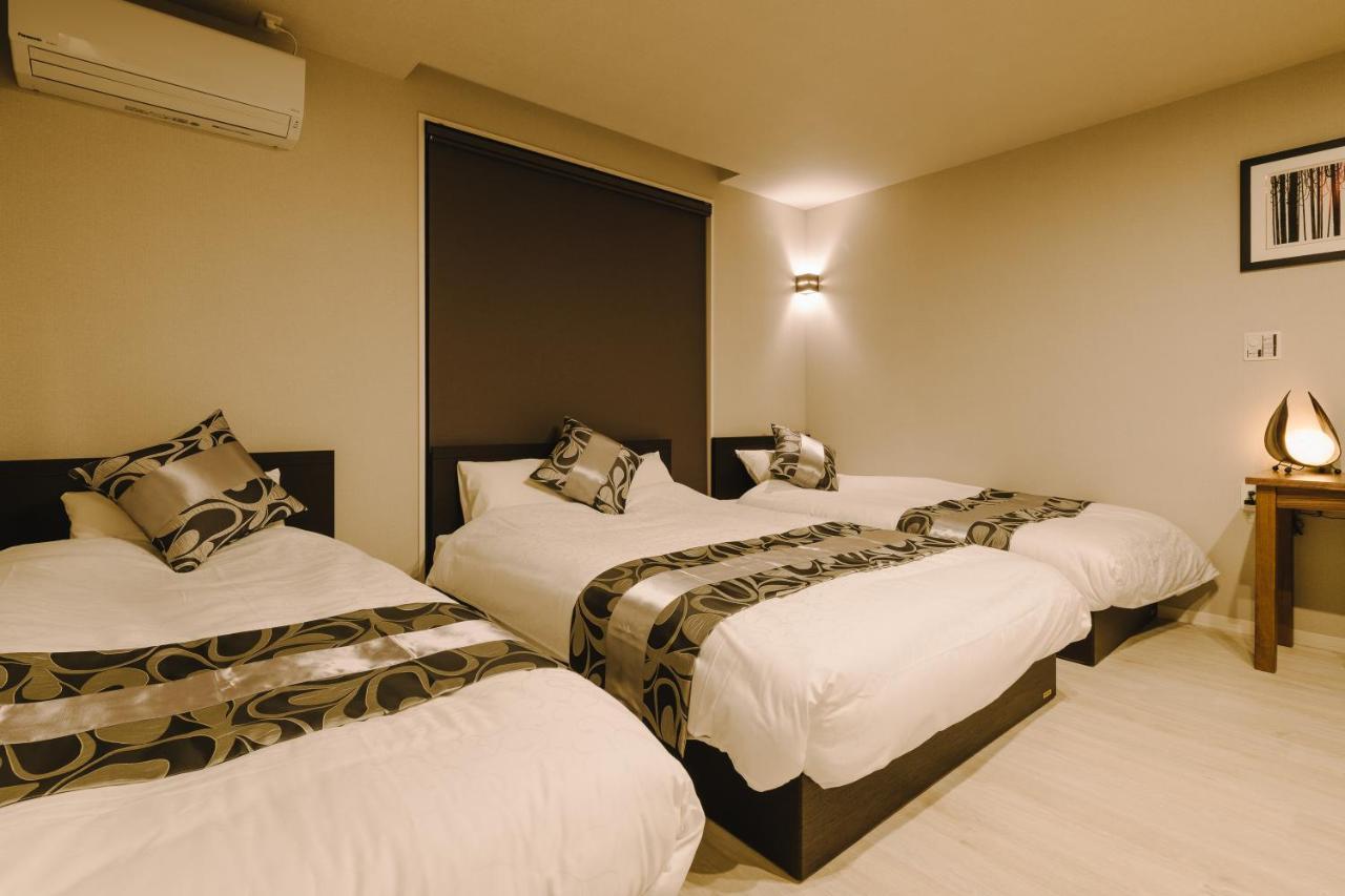 Grand Base Karatsu Ekiminami Aparthotel Bagian luar foto
