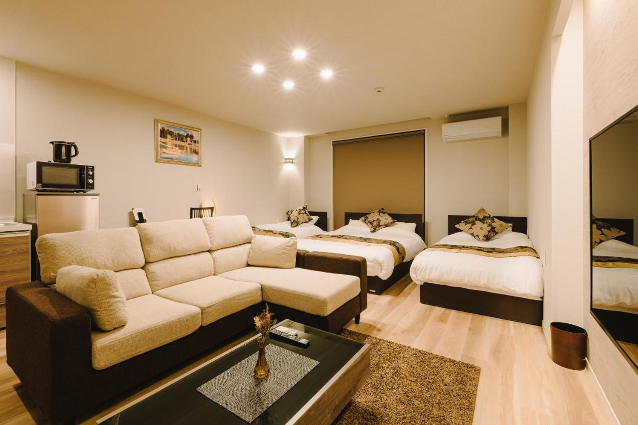 Grand Base Karatsu Ekiminami Aparthotel Bagian luar foto