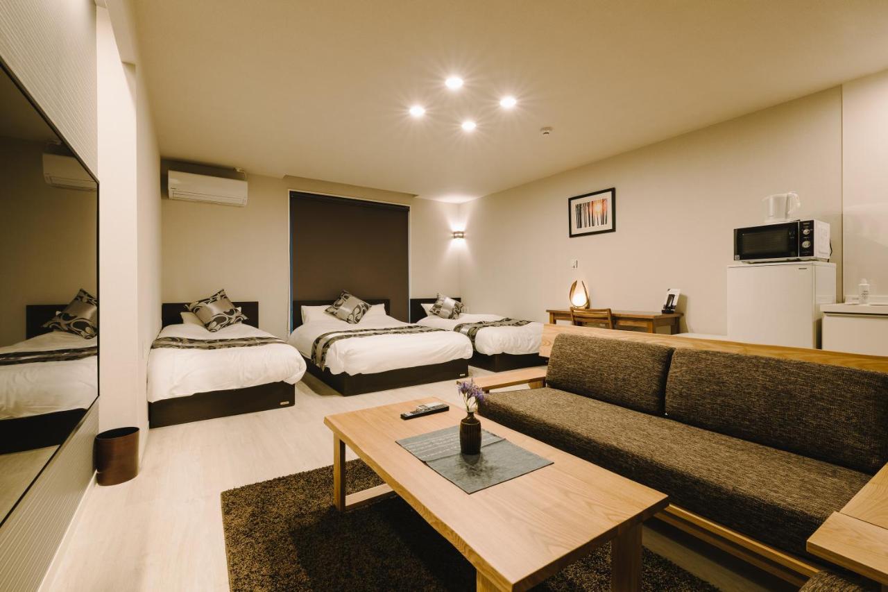Grand Base Karatsu Ekiminami Aparthotel Bagian luar foto