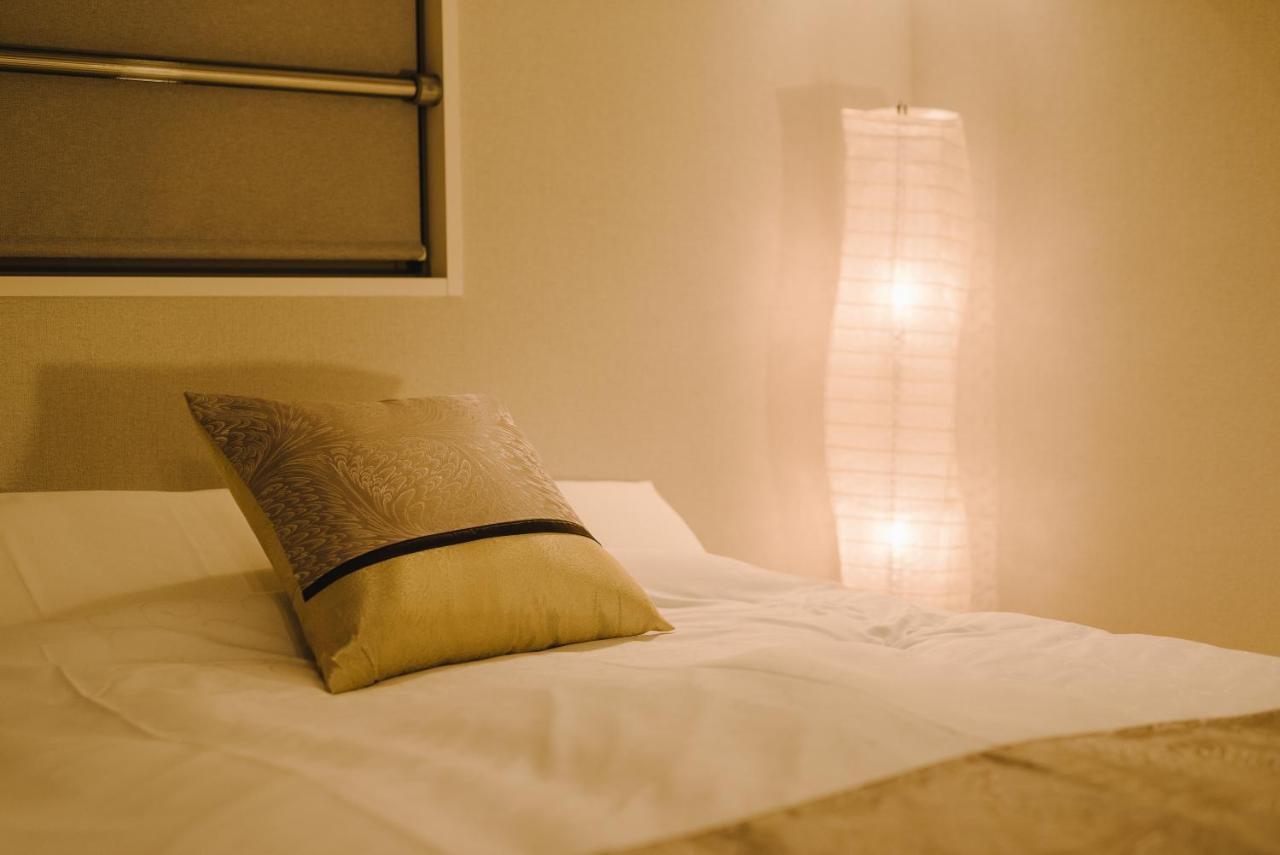 Grand Base Karatsu Ekiminami Aparthotel Bagian luar foto